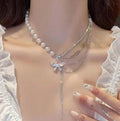 ARYAMI™ Elegant Pearl & Butterfly Layered Necklace for Women – Premium Silver Finish